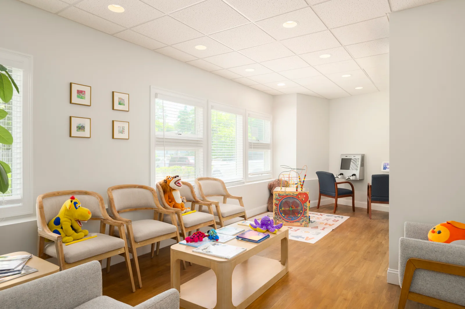Kid-friendly waiting room with toys and play area